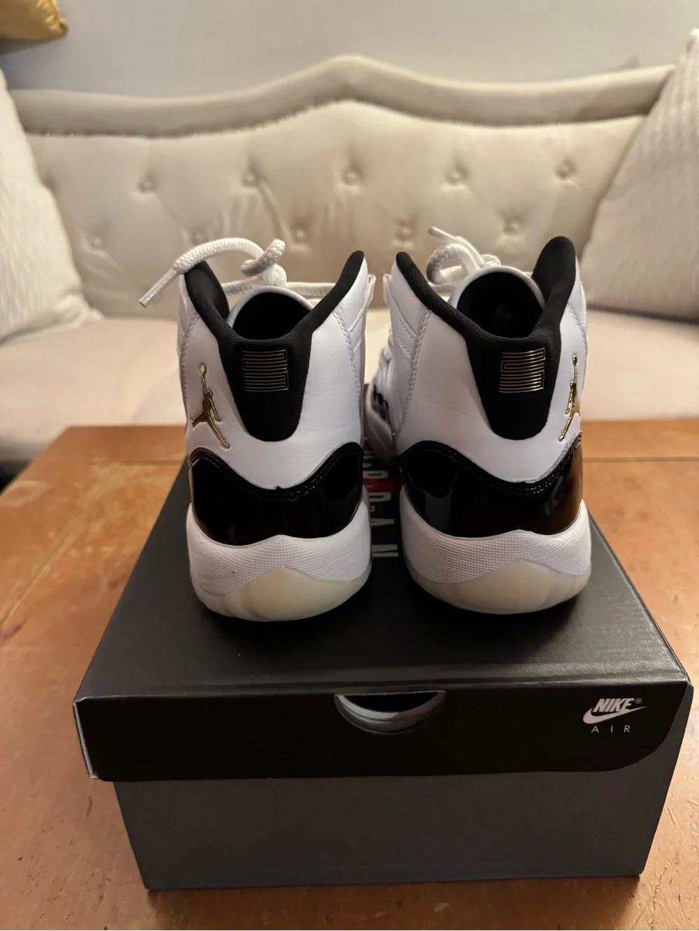 Air Jordan 11 Retro (GS) Big Kid’s Sneakers in White and Patent Black